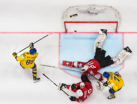 William Nylander of Sweden scores 2-1 behind goaltender