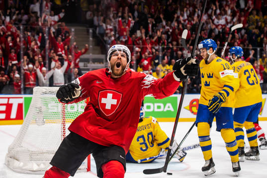 Joel Genazzi of Switzerland celebrates
