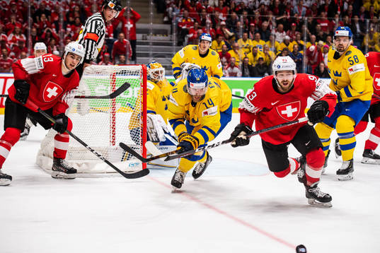 Mattias Ekholm of Sweden and Lino Martschini of Switzerland