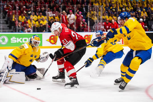 Goaltender Henrik Lundqvist and Adam Larsson against Kevin