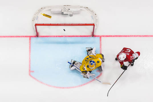 Gaetan Haas of Switzerland (not in picture) scores 3-3