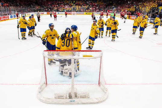 Players of Sweden celebrate