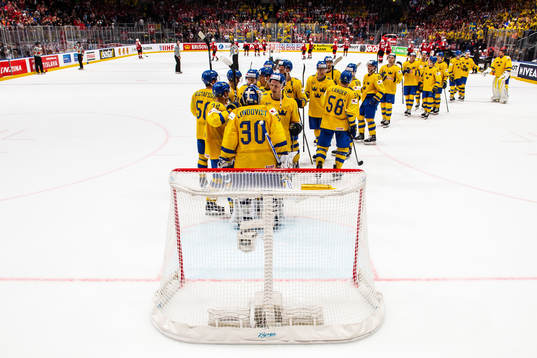 Players of Sweden celebrate
