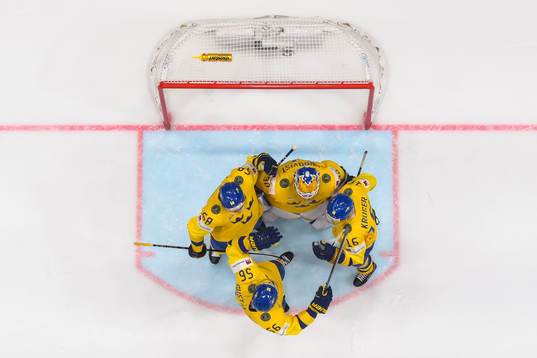 Erik Gustafsson, Anton Lander, goaltender Henrik Lundqvist