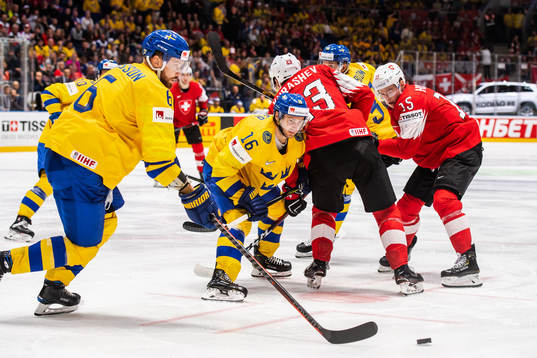 Adam Larsson and Marcus Krüger of Sweden against Philipp