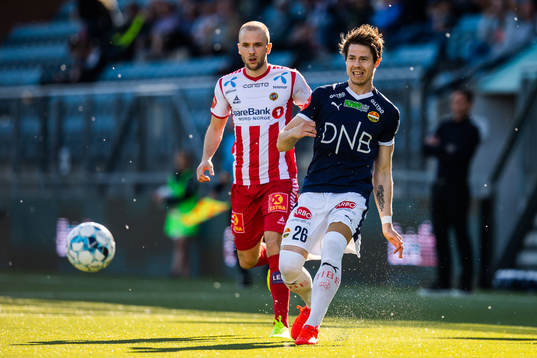 Lasse Nilsen of Tromsø and Lars Vilsvik of Strømsgodset