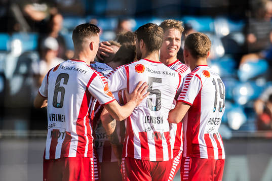 Kent-Are Antonsen of Tromsø celebrate with teammates