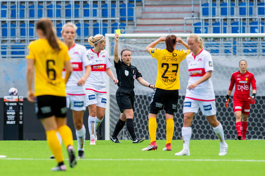 Maria Brochmann of Sandviken is shown a yellow card by