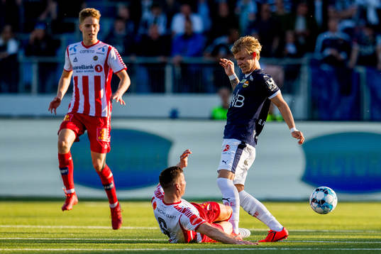 Juha Markus Pirinen of Tromsø and Sebastian Pedersen of