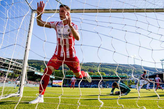 Martin Rønning Ovenstad of Strømsgodset scores 2-1 behind