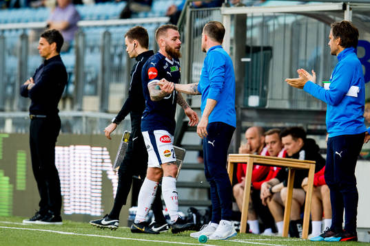 Martin Spelmann of Strømsgodset and Håkon Wibe-Lund,