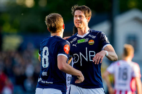 Johan Hove of Strømsgodset celebrates with teammate Lars