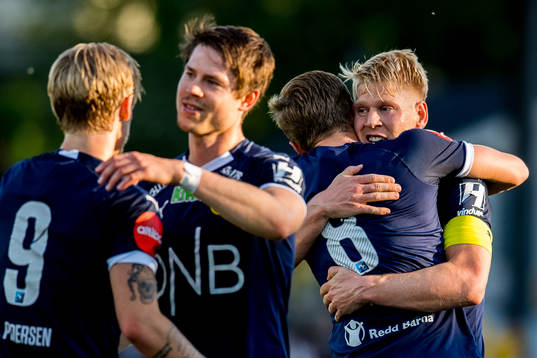 Johan Hove of Strømsgodset celebrates with teammate Jakob