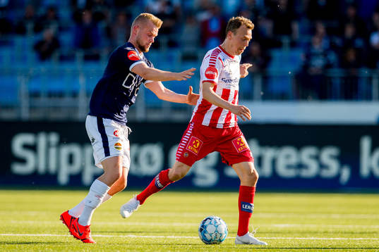 Herman Stengel of Strømsgodset and Magnus Andersen of