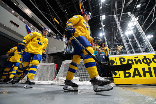 Marcus Krüger and Robert Hägg of Sweden enters the ice
