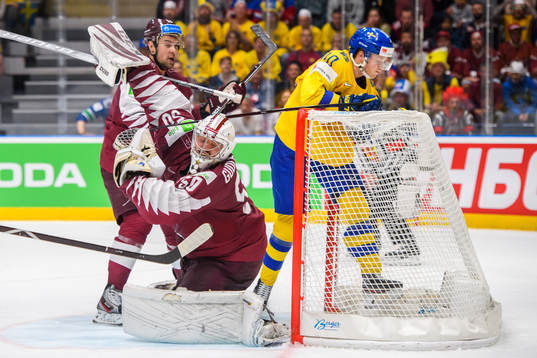 Elias Pettersson of Sweden against Kristaps Sotnieks and