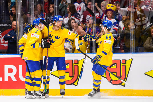 John Klingberg, Adrian Kempe and William Nylander celebrates