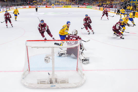 Adrian Kempe of Sweden score the 2-1 goal behind goaltender