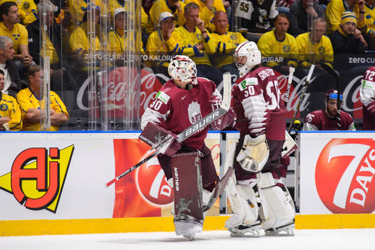 Goaltender Kristers Gudlevskis and goaltender Elvis