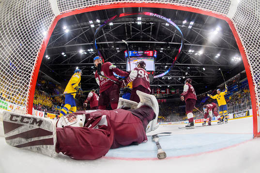 Goaltender Kristers Gudlevskis of Latvia looks dejected