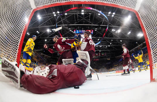 Goaltender Kristers Gudlevskis of Latvia looks dejected