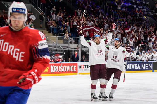 Janis Jaks and Uvis Balinskis of Latvia celebrate