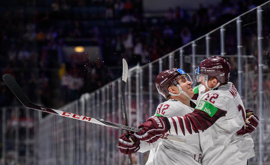 Arturs Kulda and Rihards Marenis of Latvia celebrate