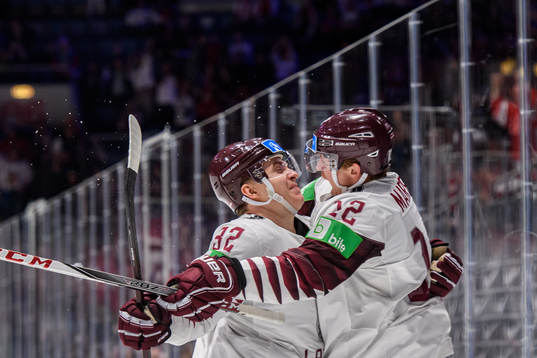 Arturs Kulda and Rihards Marenis of Latvia celebrate