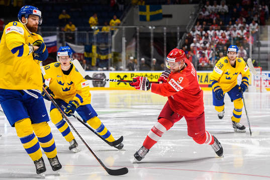 Dmitry Orlov of Russia and Adam Larsson of Sweden