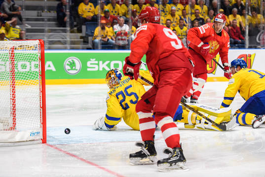 Artyom Anisimov of Russia scores the 1-1 goal behind