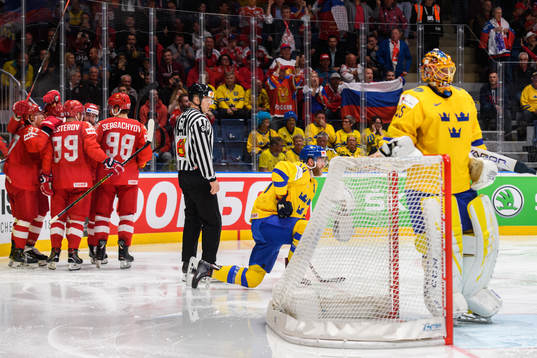 Mattias Ekholm and goaltender Jacob Markström of Sweden