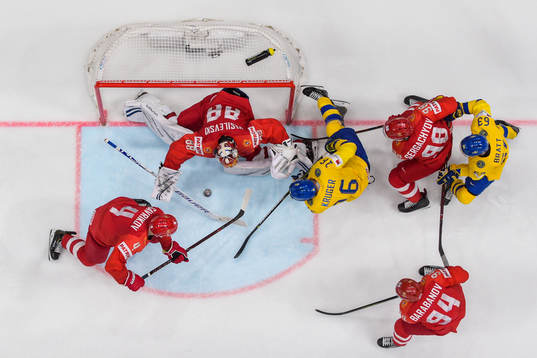 Marcus Krüger and Jesper Bratt of Sweden against Mikhail