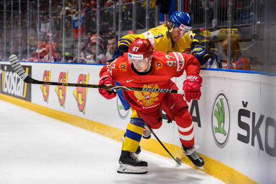 Nikita Gusev of Russia in action with Adrian Kempe of Sweden