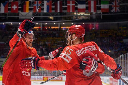 Ivan Telegin and Mikhail Grigorenko of Russia celebrate the