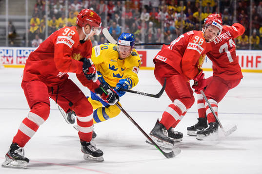 Dennis Rasmussen of Sweden in action with Yevgeny Kuznetsov