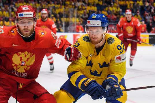 Nikita Nesterov of Russia and Gabriel Landeskog of Sweden