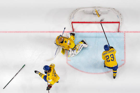 Adrian Kempe, goaltender Jacob Markström and Oliver Ekman