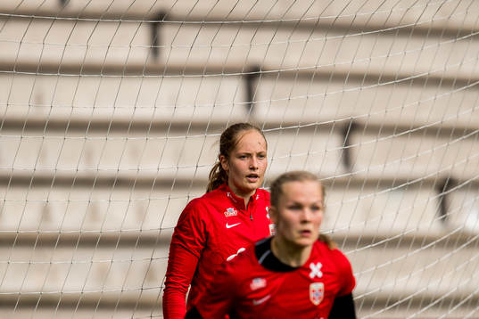 Goalkeeper Aurora Mikalsen and Oda Maria Hove Bogstad of