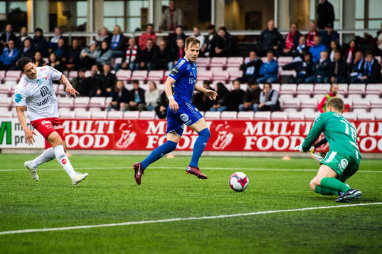 Kjell Rune Sellin of FFK against Nicolai Næss and