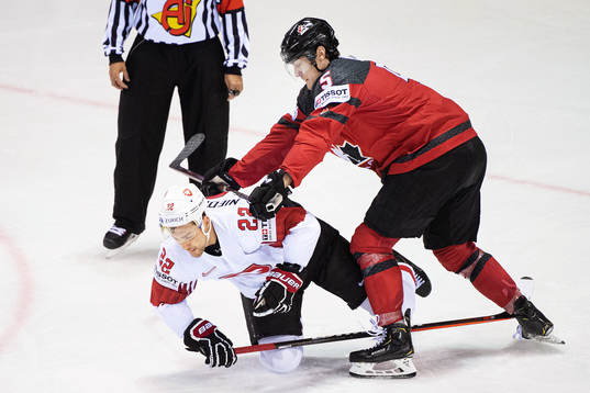Nino Niederreiter of Switzerland and Philippe Myers of