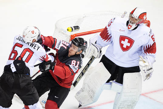 Tristan Scherwey of Switzerland in a fight with Jonathan