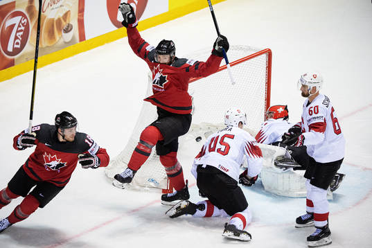 Pierre-Luc Dubois and Sean Couturier of Canada celebrates