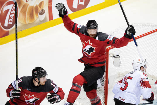 Pierre-Luc Dubois and Sean Couturier of Canada celebrates
