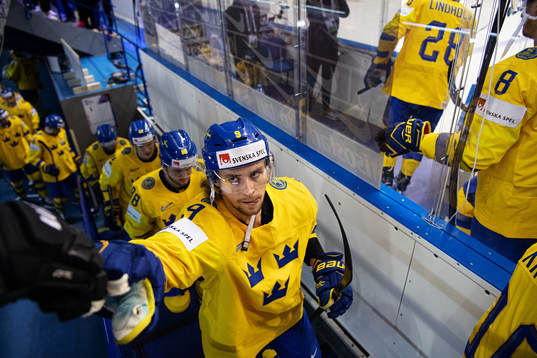 Adrian Kempe of Sweden fist bumps with a fan