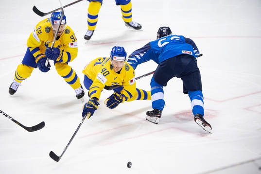 Gabriel Landeskog and Elias Pettersson of Sweden  against