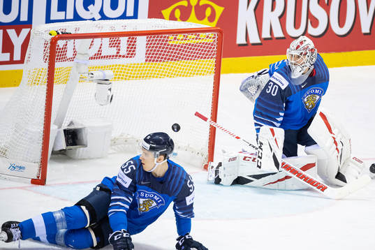 John Klingberg of Sweden scores 1-1 behind goaltender Kevin