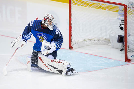 Elias Pettersson of Sweden (not in picture) scores 1-3