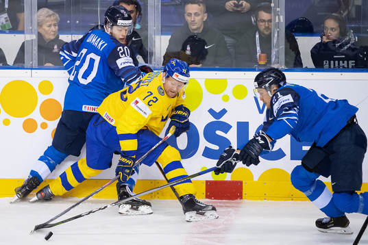 Niko Ojamäki and Juhani Tyrväinen of Finland in action