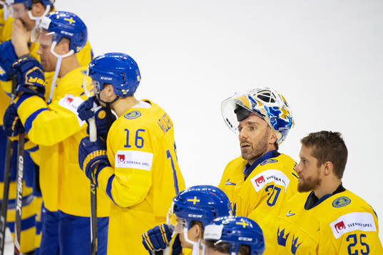goaltender Henrik Lundqvist of Sweden looks dejected