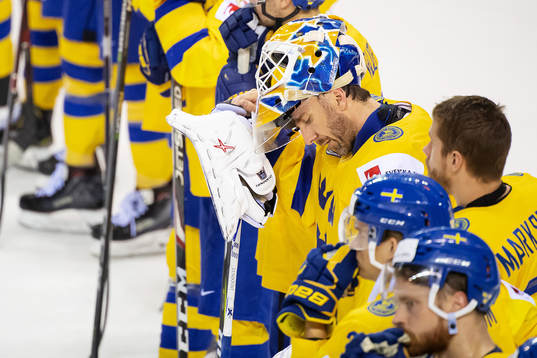 goaltender Henrik Lundqvist of Sweden looks dejected